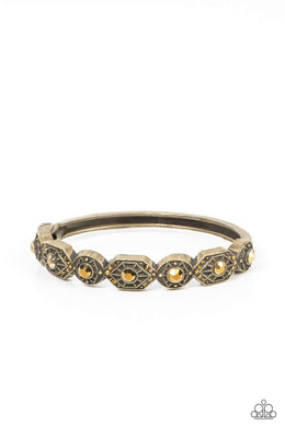 Eye-Opening Opulence - Brass Hinged Bracelet